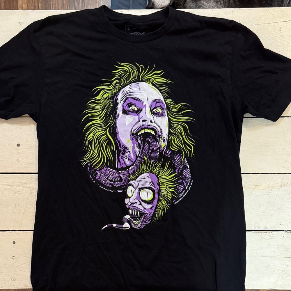 Black Graphic Tee with Purple and Green Design